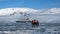 Zodiac in front of an expedition cruise ship in Antarctica