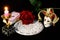 Zodiac horoscope, bright candle, red rose, Queen of flowers, cards for predictions, carnival jester mask, symbol of transformation