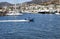 Zodiac passes by and goes into Bodrum marina.