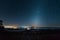 Zodiacal light over mountain.