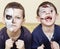 Zombie apocalypse kids concept. Birthday party celebration facepaint on children dead bride, scar face, skeleton