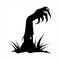 Zombie hand black silhouette.  A zombie hand crawls out of the ground.