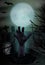 Zombie hand rising from the grave. Graveyard with tombstones and moon. Halloween vertical background. Vector