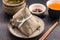 Zongzi or Asian Chinese sticky rice dumplings with Yellow tea, s