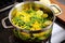 zoodles in a glass pot with a stir fry ready for cooking