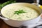 zoodles soaking in a creamy alfredo sauce