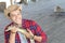 Zookeeper enjoying work with a baby caiman