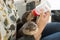 Zookeeper feeding baby otter