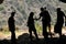 Zoologist scientists emerge from a cave