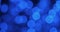 Zoom. Defocused christmas background, blue bokeh lights