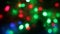 Zoom multicolored bokeh lights. Christmas and new year lights twinkling.