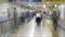 Zoom Out - Blurred Time Lapse of Commuters at Busy Tokyo Metrorail System