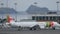 Zoom out on passenger aircraft parked at Madeira airport. 4K Ultra HD