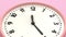 Zoom out Pink Pastel Round Clock Spin Backward.