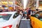 Zoom picture of a street scene with crossing people in Manhattan, New York City