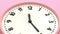 Zoom in Pink Pastel Round Clock Spin Backward.