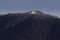A zoom shot of Grouse Mountain ski hill after a light dusting of snow