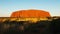 Zoom in shot of Uluru in Australia at sunset