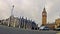 Zoom timelapse of commuters and vehicles on Westminister square in London