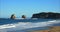 Zoom view of Hendaye beach with a view on the famous twin rocks
