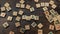 Zoom in the word PLAY made of scattered wooden alphabet letters on the brown wooden table