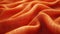 A zoomed-in shot of a fabric in a warm, hypothetical Sunset Orange, showcasing its texture and warm color, occupying the