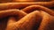 A zoomed-in shot of a fabric in a warm, hypothetical Sunset Orange, showcasing its texture and warm color, occupying the