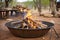 zoomed-in shot of a fire pit at a safari camp