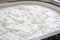 zoomed view of curd texture in the vat