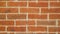 Zooming beautiful hand made red brick wall, loft interior.