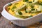 Zucchini casserole with cheese, eggs and green onion