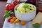 Zucchini noodles in a bowl with fresh vegetables