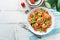 Zucchini noodles sauteed with cherry tomato and prawns