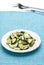 Zucchini salad with egg and olives