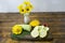 Zucchini and small yellow squash on a cutting board are sliced. Mono diet concept, healthy food. Selective focus, dark wooden