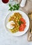 Zucchini waffles with salmon and benedict egg, fodmap diet top view