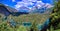 Zugspitze and valley with a cyan lake in the foreground in Biberwier, Tirol