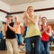 Zumba or Jazzdance - people dancing in studio