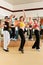 Zumba or Jazzdance - people dancing in studio