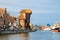 Zuraw Crane and colorful buildings on Motlawa river, Gdansk, Pol