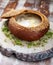 Zurek, sour soup made of rye flour with sausage and egg served in bread bowl. Popular Easter dish