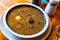 Zurek staropolski - old Polish style sour rye soup served with sausage and egg