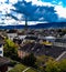 Zurich chruch tower old town historic city centre valley view from zurich university switzerland sun shadow mountain