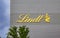 ZURICH, SWITZERLAND - AUGUST 3, 2022: Logo of Swiss chocolatier and confectionery company Lindt on Lindt factory in Zurich