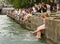 Zurich, Switzerland - June 03, 2017: People on quay Lake Zurich.