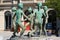 Zwickau, Germany - May 3, 2023: Sculpture of dancing children in a fountain in front of the theater on central Market Square