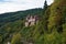 Zwingenberg castle enthroned over railway track in the Odenwald forest