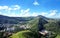 Ãguas de LindÃ³ia/SP - Brazil: Landscape with mountains against a blue sky with clouds