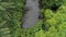 â€¢	Lake in the rainforest. Top view. Aerial. Thailand.