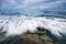 â€¨Rocks and waves at Kings Beach, QLD.